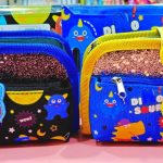 Esmi®- 🦖✨ *Glittery Dinosaur Pencil Pouch* ✨