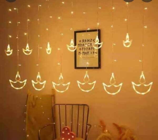 Esmi- ? *Diya Led Light 12 strings 11ft curtain*
