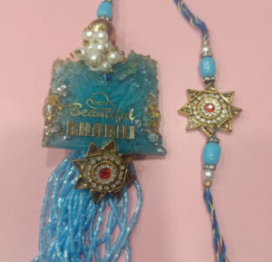 esmi-beautiful-bhabhi-bhai-rakhi-set.jpg Esmi- *Beautiful Bhabhi & Bhai Rakhi Set*