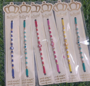 esmi-evil-eye-colourful-rakhi.jpg Esmi?- *Evil Eye Colourful Rakhi*