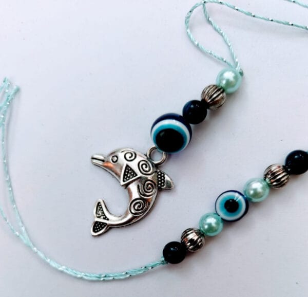 Esmi- *Evel eye - Dolphin Rakhi Combo*