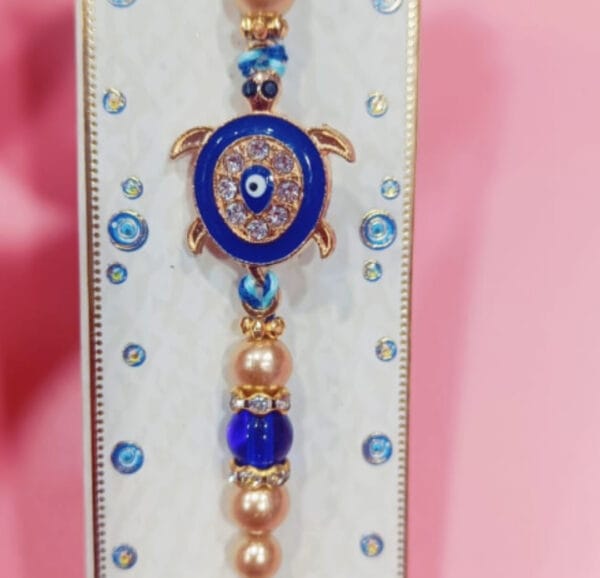 Esmi- *Evil Eye Rakhi- Studded Rakhi*