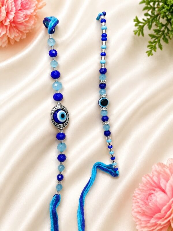 2026/07/1002853721.jpg Esmi®- *Evil Eye Rakhi*